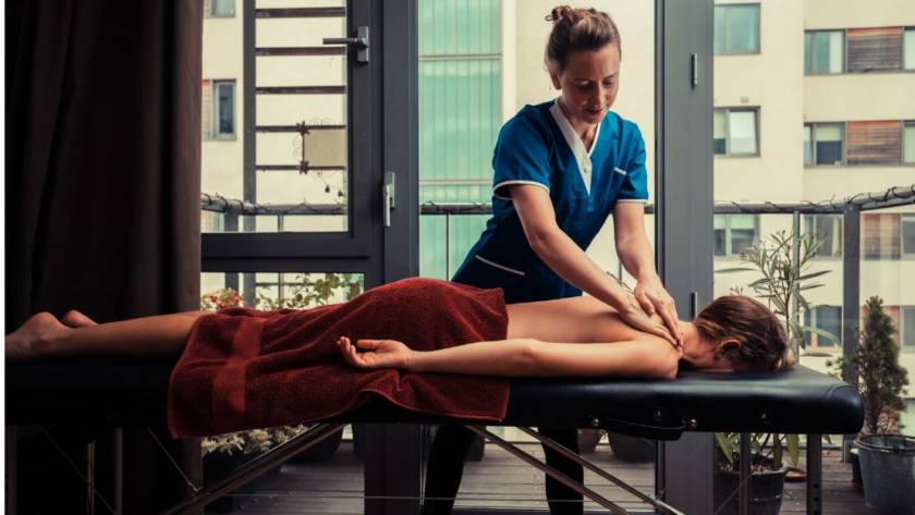 female patient in massage table having a remedial massage session